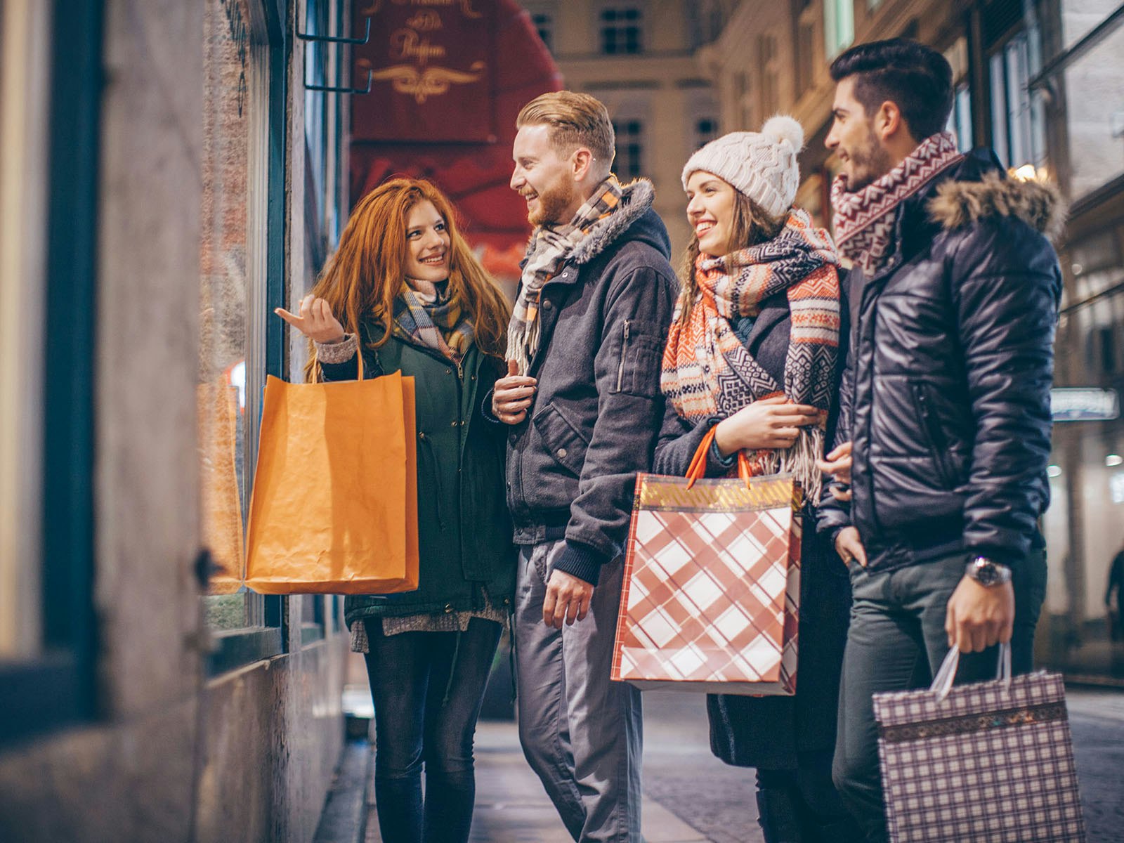 Winter holiday shopping in the city with friends