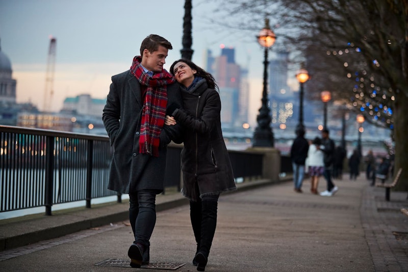 Couple walking down promenade in London