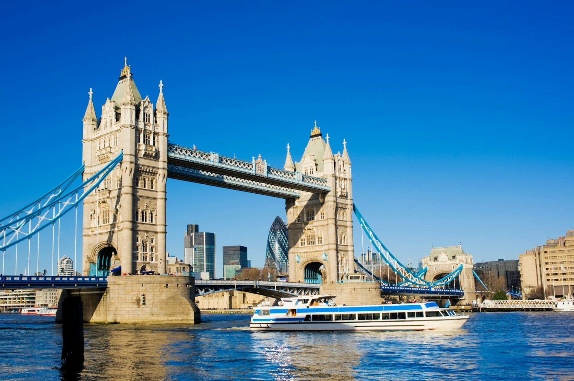 Tower Bridge with boat on River Thames