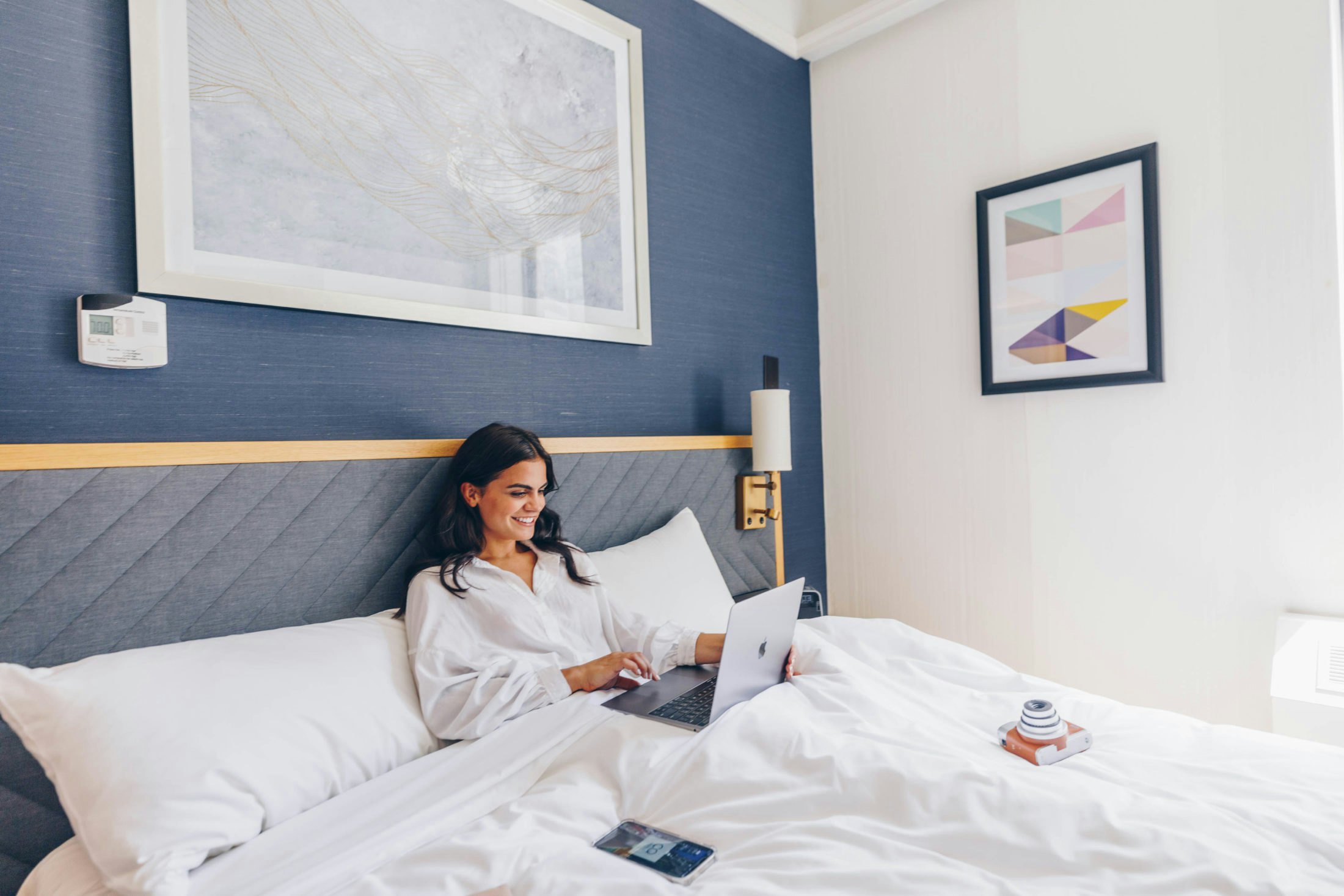 Working Remotely from bed with Club Quarters Times Square Hotel Deals