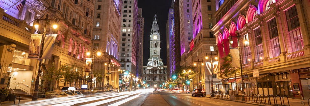 Philadelphia city hall historic clock down Broad Street at night on Valentine's Day in Philadelphia
